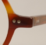 PLASTIC VINTAGE EYEGLASSES DETAIL photo, under 350 kb