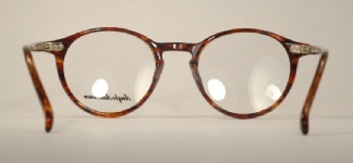 PLASTIC VINTAGE EYEGLASSES BACK photo, under 350 kb