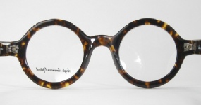 PLASTIC VINTAGE EYEGLASSES SIDE photo, under 350 kb