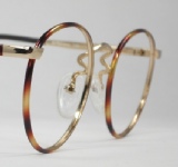 WIRE VINTAGE EYEGLASSES ANGLE photo, under 350 kb
